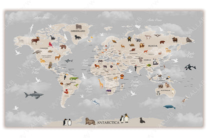 This illustrated world map features animals unique to each region on a gray-toned backdrop. Icons of animals like pandas in China, kangaroos in Australia, and penguins in Antarctica highlight global biodiversity. Surrounded by labeled oceans and a subtle depiction of clouds, the map combines geographic clarity with a playful educational theme.