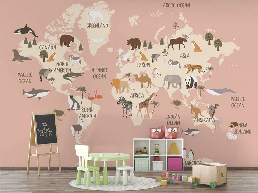 This illustrated world map features a soft background with continents labelled and decorated with region-specific animals. Examples include polar bears in Greenland, lions and giraffes in Africa, and pandas in Asia. Oceans are named, and the map includes aquatic life such as whales and sharks, creating a whimsical educational piece.