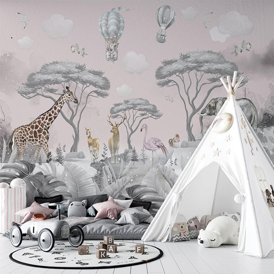 This illustration showcases a serene jungle scene with a soft pink backdrop. It features a giraffe, flamingo, deer, and elephants amidst acacia trees, tropical foliage, and delicate flowers. The sky above includes whimsical hot air balloons, soft clouds, and flying birds, creating a dreamy, safari-inspired atmosphere.