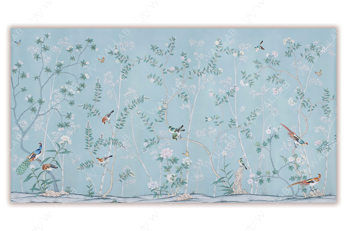 A delicate mural featuring intertwining branches with small blossoms and vibrant birds perched throughout, set against a serene light blue background. The intricate details of flowers, leaves, and butterflies create a tranquil, nature-inspired aesthetic with a timeless elegance