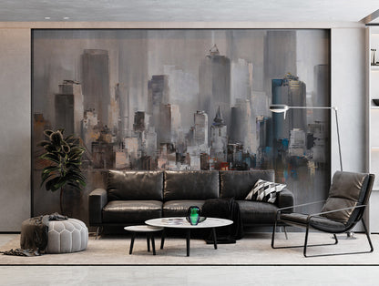 A striking wallpaper mural featuring an abstract cityscape with tall skyscrapers and a suspension bridge reflected in a calm body of water. The design incorporates muted gray and neutral tones with splashes of warm and cool colors, blending modern architecture with an artistic, painterly style. Ideal for adding urban sophistication to interior spaces.