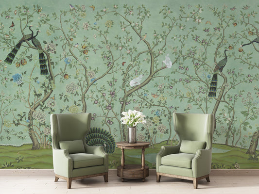 An intricate design featuring peacocks perched on twisting tree branches amidst a lush, floral landscape. The scene is rendered in a soft background, adorned with delicate flowers, butterflies, and small birds, creating a luxurious and ornamental atmosphere. Perfect for traditional or vintage-inspired interior designs.